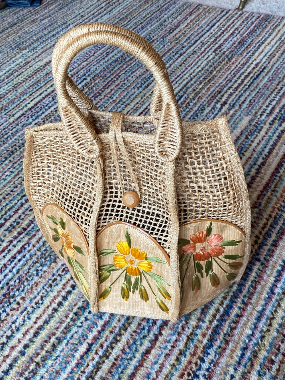 Handmade raffia handbag with woven flowers
